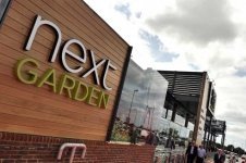 Next grows out of clothes – and into garden centres